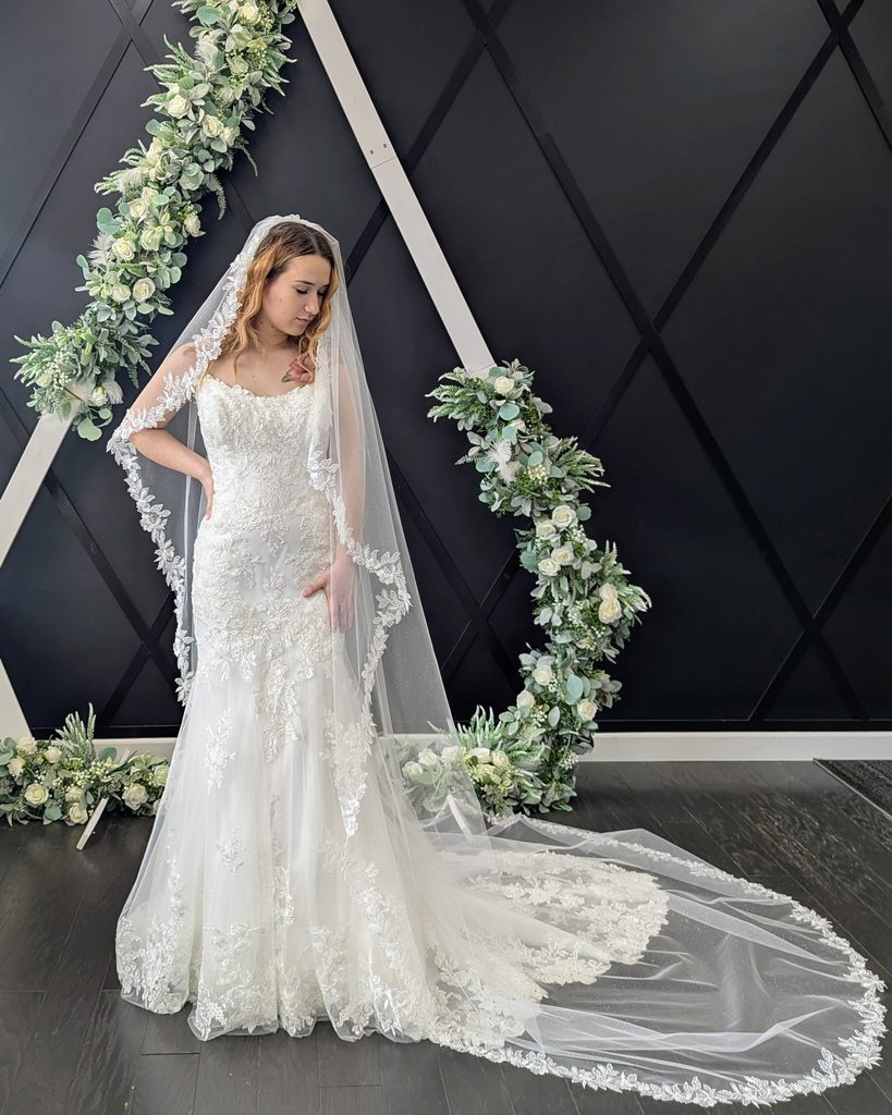 Elegant fitted wedding gown in Catherine's Bridal Boutique