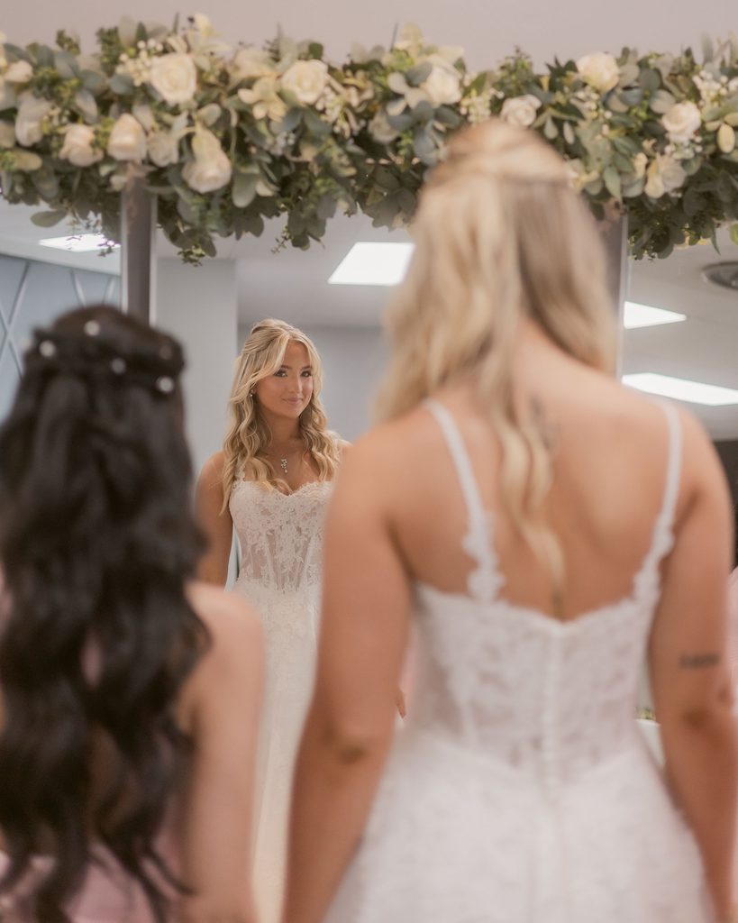 Bride looking in the mirror at Catherine's Bridal Boutique, a bridal shop in Valparaiso Indiana